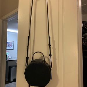 French Connection Navy Round Crossbody bag.